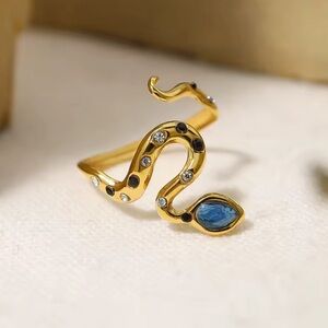 Serpenti Elegant Gold Snake Ring with Blue Accents